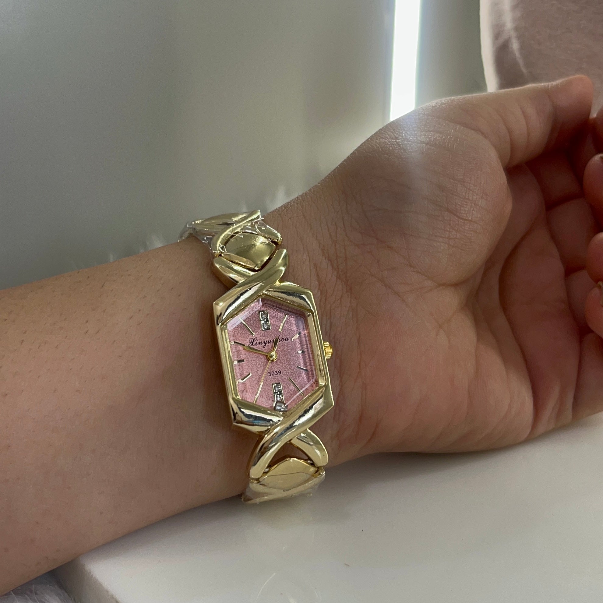 Pink dail watch