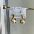 Pearl swirl earrings