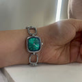 Silver green dail watch